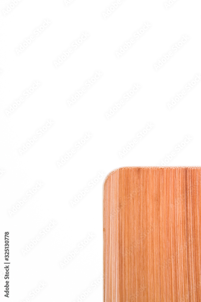 Top view on corner of a wooden cutting board