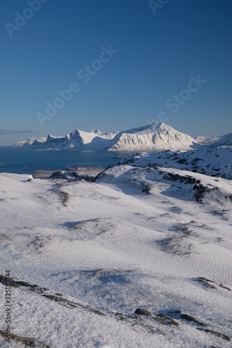 View to winter scenery of beautiful Lofoten islands located in northern Norway.  Place where ocean meets mountains. Touristic place near by Kvalvika beach. Perfect for outdoor activities. © Jiri