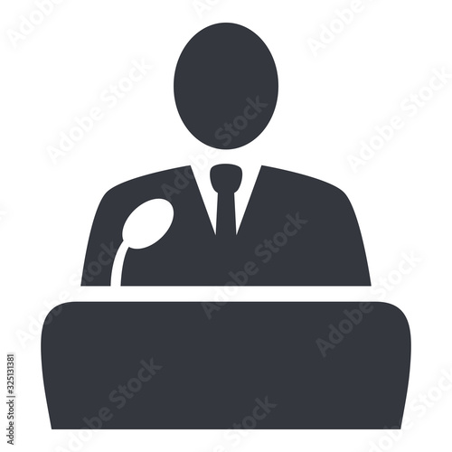 Vector Politician Icon - Man in Suit in front of Microphone photo