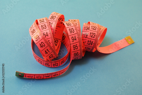 Tape for measuring body volume on a bright background.