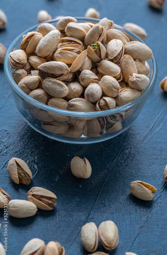 Roasted And Salted Pistachios In Glass Bowl Roasted And Salted Pistachios In Glass Bowl