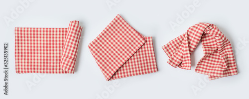 Foto Red tablecloth or kitchen towel collection on white background.