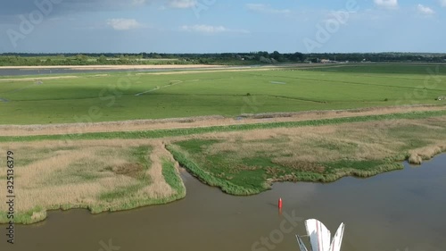 Drone flight through the blades of a windmill