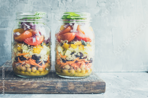 Fresh colorful salad in the jar