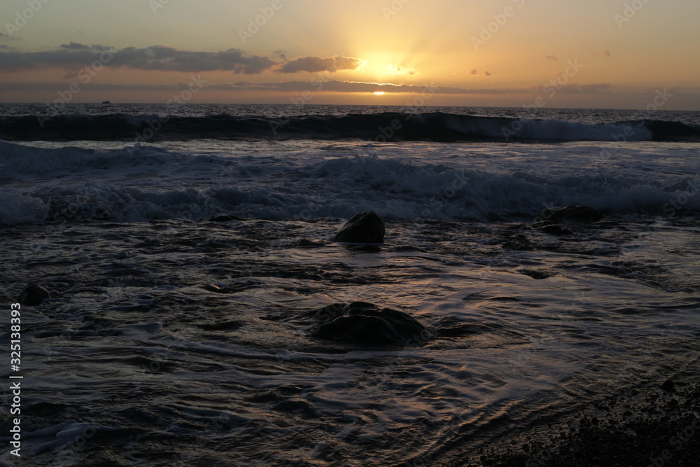 Naklejka premium sunset over the sea