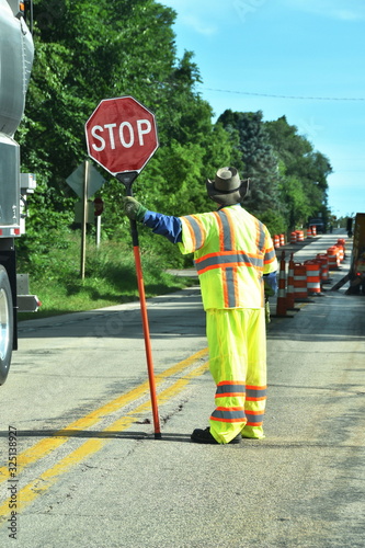 Flagman Stopping Traffic