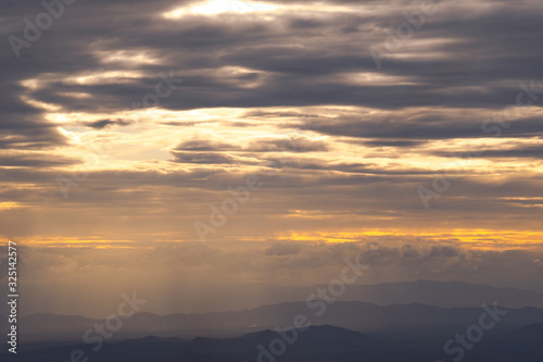 Scenic View Of Silhouette Mountains Against Sky During Sunset and beam © iHaMoo