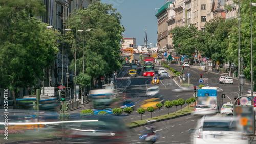 View Gran Via traffic timelapse, one of the main streets and most famous landmarks of the city in Madrid, Spain