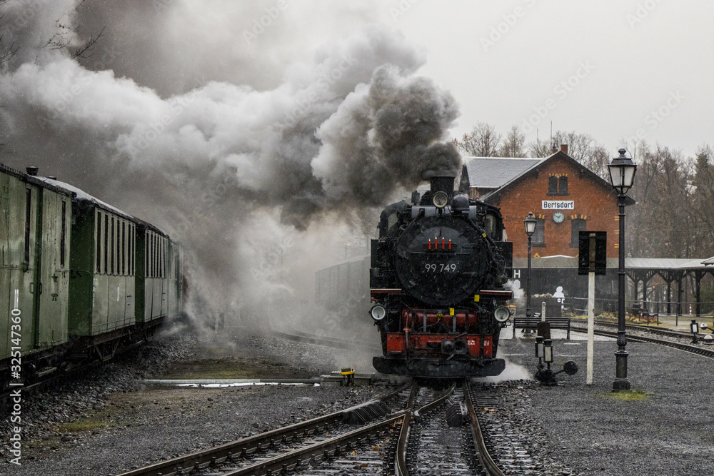 Fototapeta premium saxon steam locomotive during advent rides,
