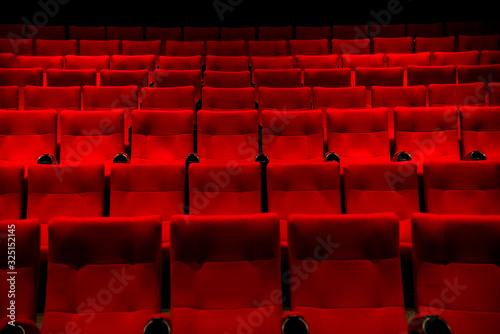 фотографія Red color  Cinema seats with no people.