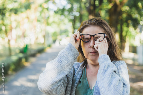 Girl with eye fatigue