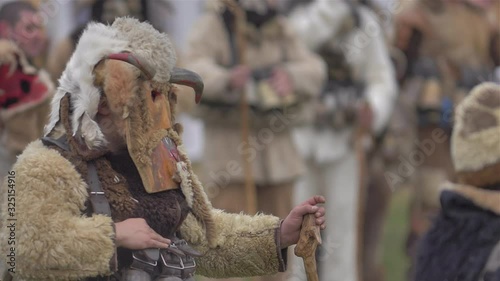 Participants take part in the International Festival of Masquerade Games Surva. The festival promotes variations of ancient Bulgarian and foreign customs and masks. x5 slow motion.