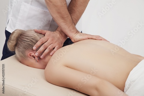 Massage of the head and cervical spine with an osteopath