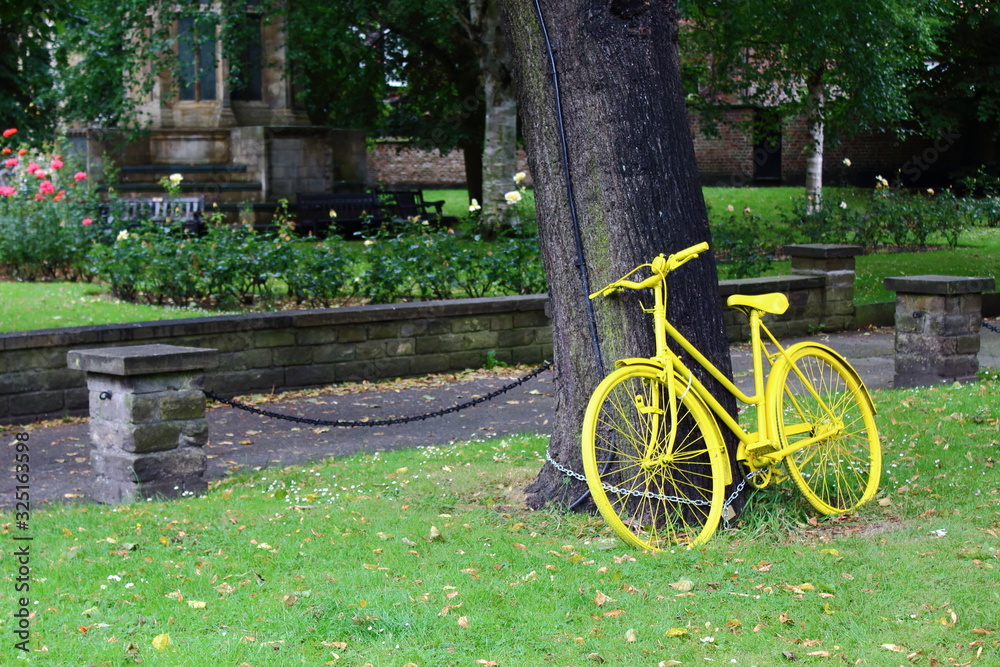 yellow bicycle in park