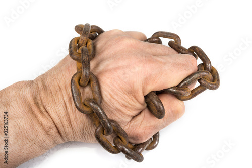 Chained man hand on a white. Freedom concept photo