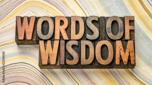 words of wisdom text in wood type