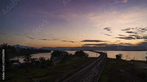 Time Lapse Of Floating Railway at Taiping,Malaysia During Sunrise.Rolling Cloud.4K