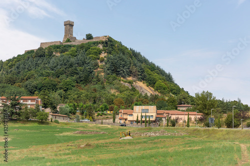 the suburb of Radicofani town and a view of the fortress, Province of Siena, Tuscany, Italy