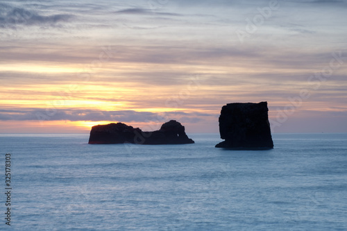 Calm sea near the shores of Dyrh  laey  Iceland