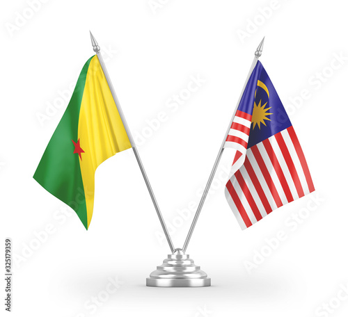 Malaysia and French Guiana table flags isolated on white 3D rendering photo