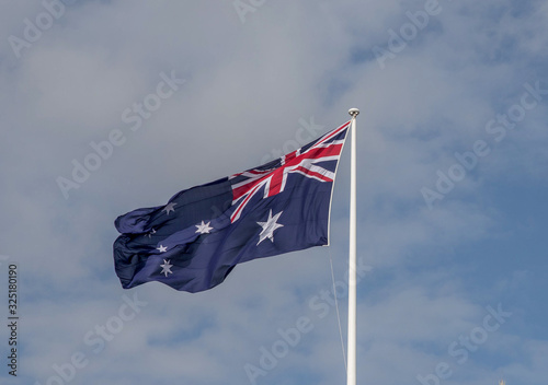 australia flag in front of blue sky