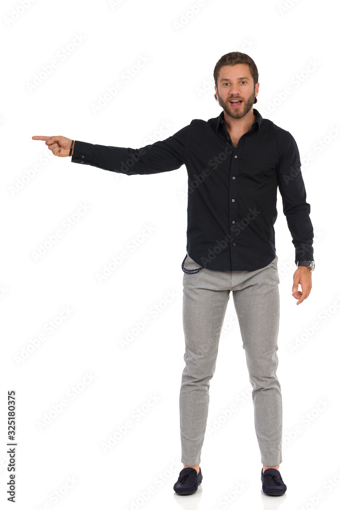 young man pointing at something young man pointing at something