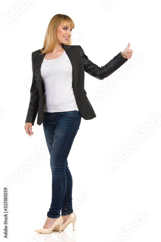 young woman with hands up