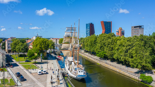 Beautiful Aerial view photo from flying drone panoramic on wooden sailing vessel Meridianas  a sunny summer day. A Symbol of Klaipeda (series) photo