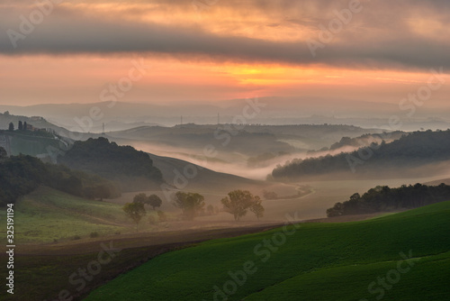 Beautiful view of the Tuscan fields in the morning mists, Pievina, Siena Province, Tuscany, Italy, Europe
