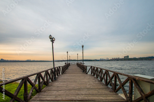Romantic wooden walkway on the lake © stocktr