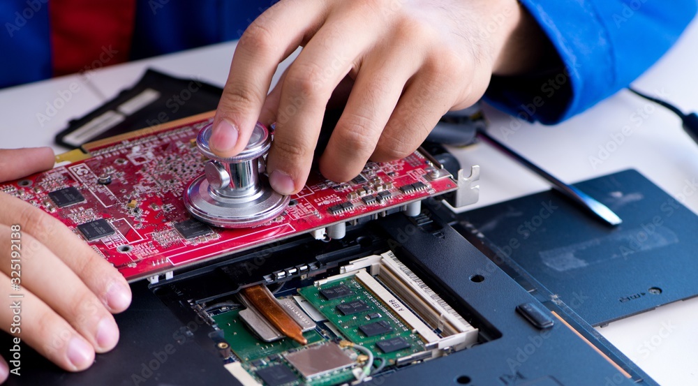 Repairman working in technical support fixing computer laptop tr