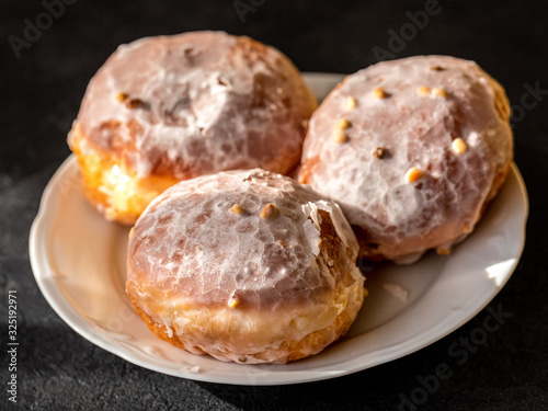 Many donuts on dark table background
