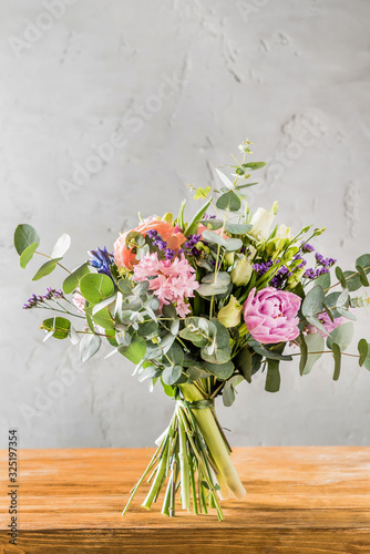spring bouquet on the wooden background