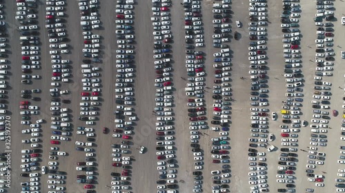 Aerial view of a of cars parked on the car park	 photo