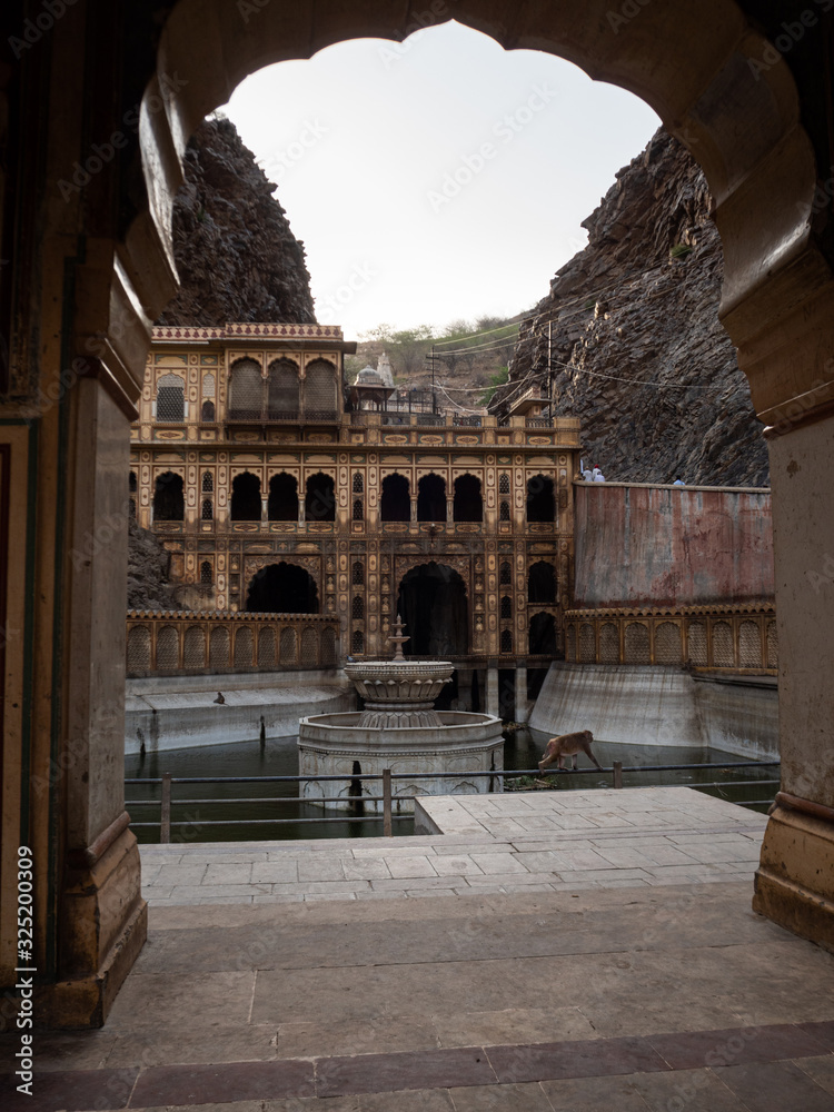 View to one of the sacred tanks of the Galtaji complex from a balcony. The place is also known as the Monkey Temple. Jaipur, India.