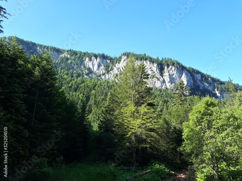 Mountain panorama with white rocks and blue sky