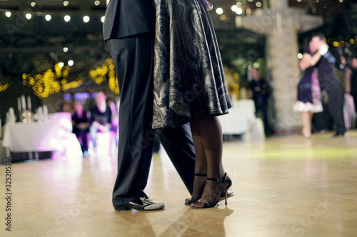 Graceful lines of legs of Argentina tango dancers © 1L26