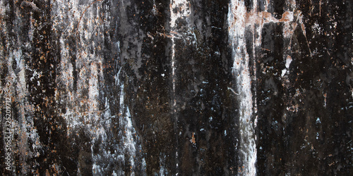 Grunge metal background and rust texture. Panoramic texture of old dark dirty iron panel damaged corrosion.  © Sergey