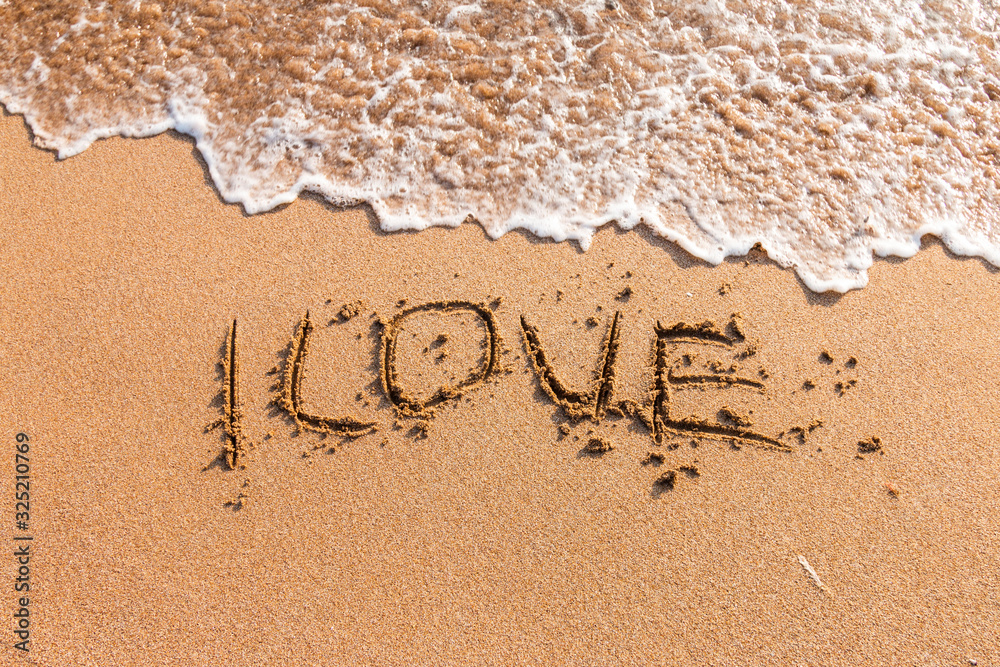 Fototapeta premium I love you written on the beach