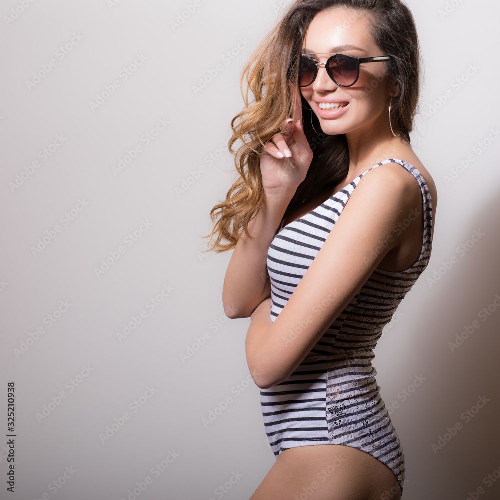 Young beautiful girl studio portrait. Young beautiful girl studio portrait.