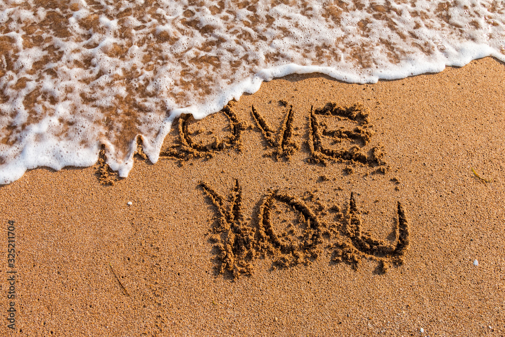 Fototapeta premium I love you written on the beach