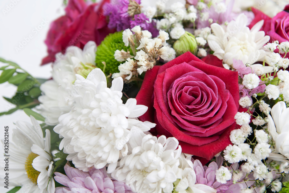 Close-up bouquet of flowers top view. Floral background, backdrop Close-up bouquet of flowers top view. Floral background, backdrop