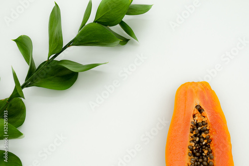 green backgrounds and papaya fruits