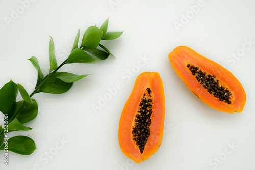 green backgrounds and papaya fruits
