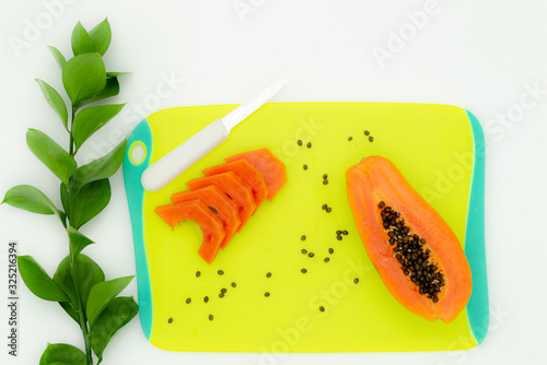 green backgrounds and papaya fruits