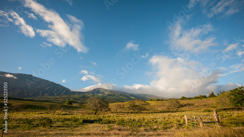 Rolling Hills and blue sky, Kaupo Gap, Maui, Hawaii photo