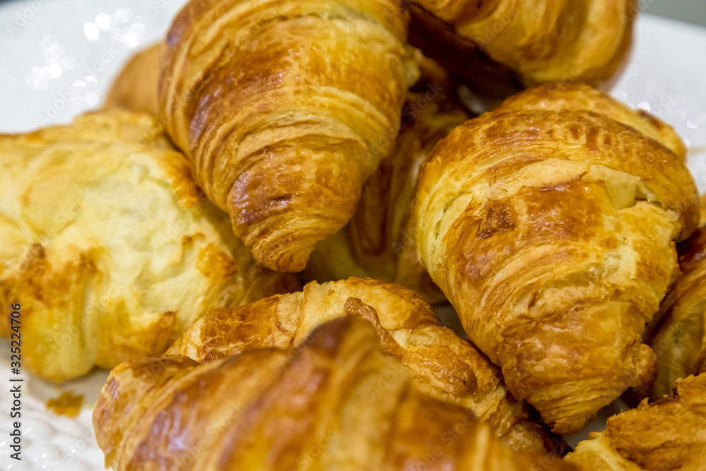 fresh croissants in a basket