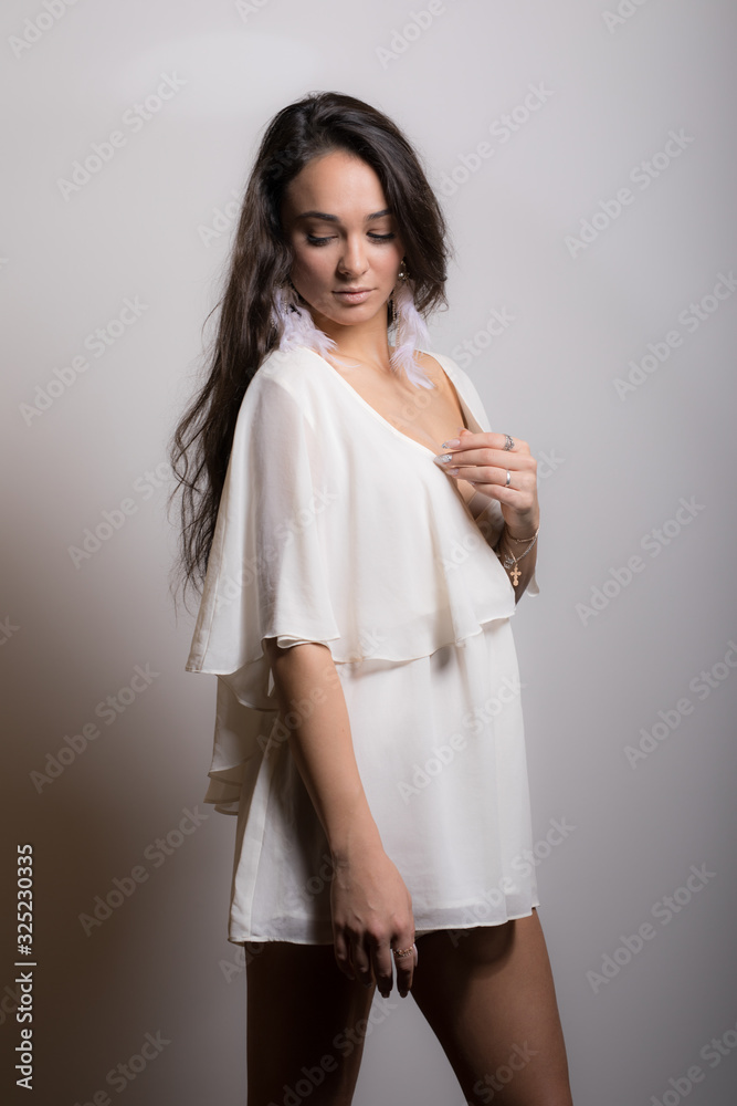 Young beautiful girl studio portrait. Young beautiful girl studio portrait.