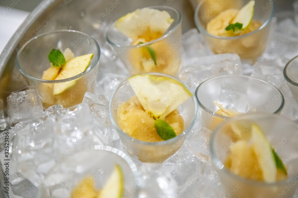 dessert with fruits sorbets on ice