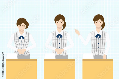 A woman standing at reception desk